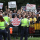 Counter-protest groups gather near a white supremacists, neo-Nazis, members of the Ku Klux Klan and other hate groups gathering for the Unite the Right rally in Lafayette Park across from the White House August 12, 2018 in Washington, DC.